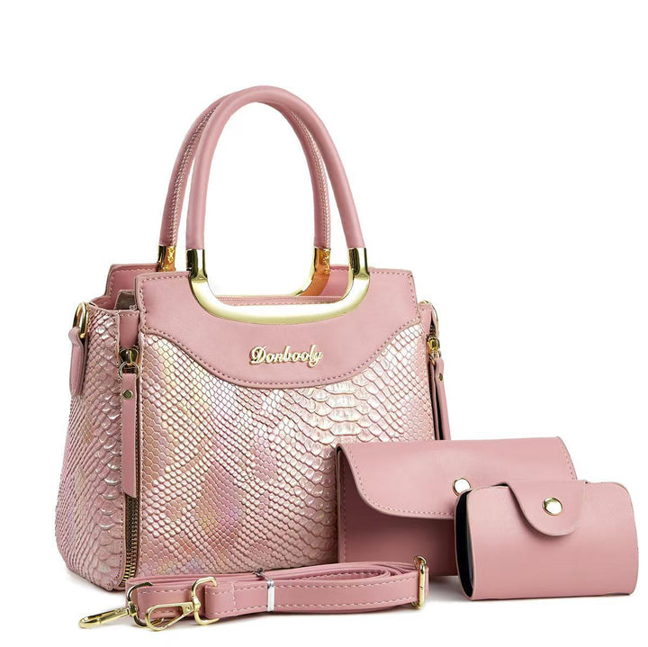 Damen stilvolle Handtasche mit Schlangenleder-Optik und abnehmbaren Accessoires Nord Taschen