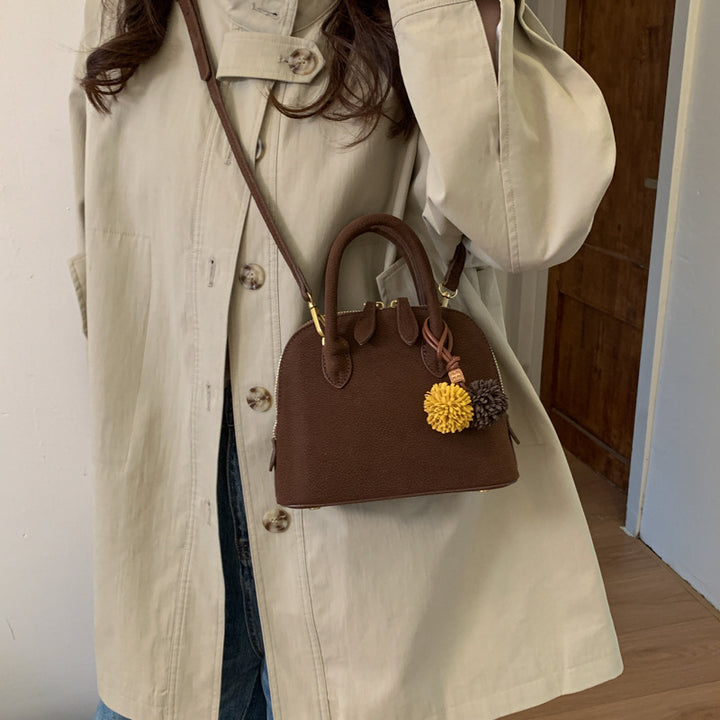Damen Handtasche mit eleganten Quasten Nord Taschen