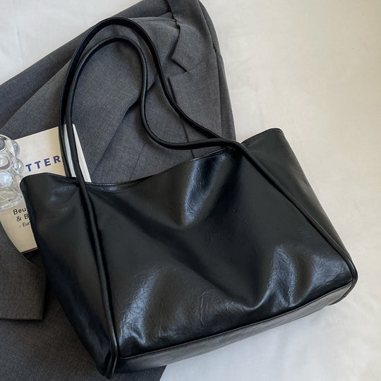 Damen elegante Schultertasche mit weichem Kunstleder und großzügigem Innenraum Nord Taschen