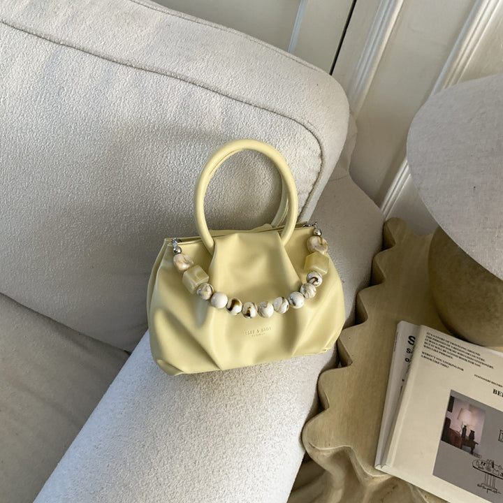Damenhandtasche mit einzigartigem Perlenakzent Nord Taschen