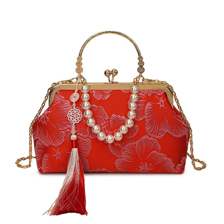 Damen elegante Abendtasche mit floralem Design und attraktiver Kettenakzent Nord Taschen