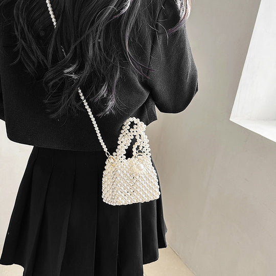 Damen Clutch-Tasche mit perlensynthetischer Oberfläche und dekorativem Verschluss Nord Taschen