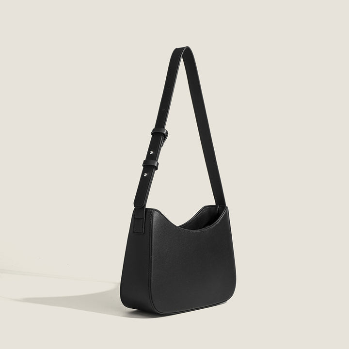 Damen Schultertasche mit geschwungener Silhouette und stylischem Gurt Nord Taschen