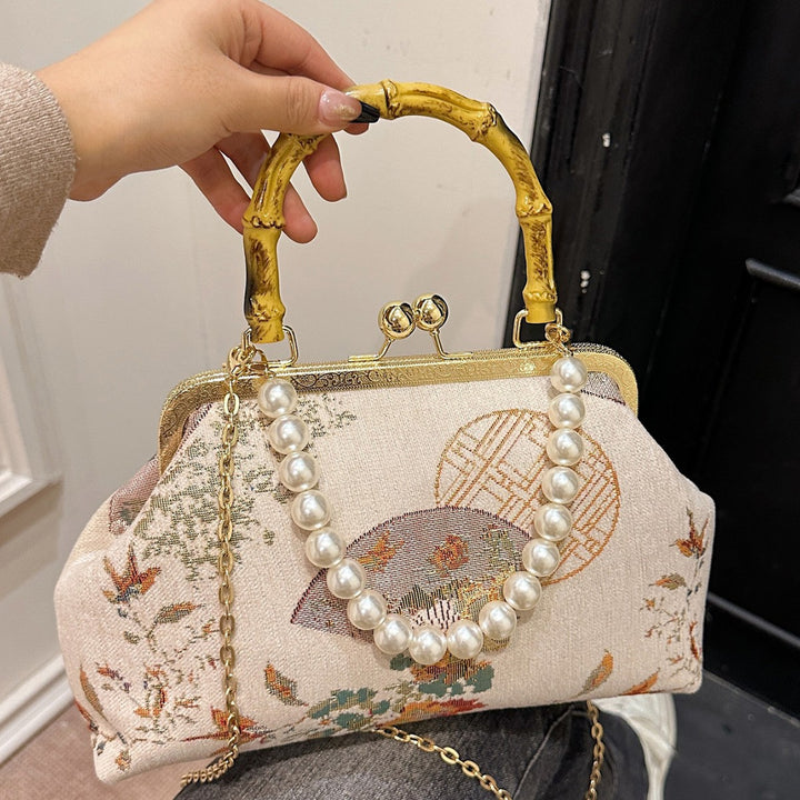 Damen elegante Umhängetasche mit kunstvollem Perlenverschluss Nord Taschen