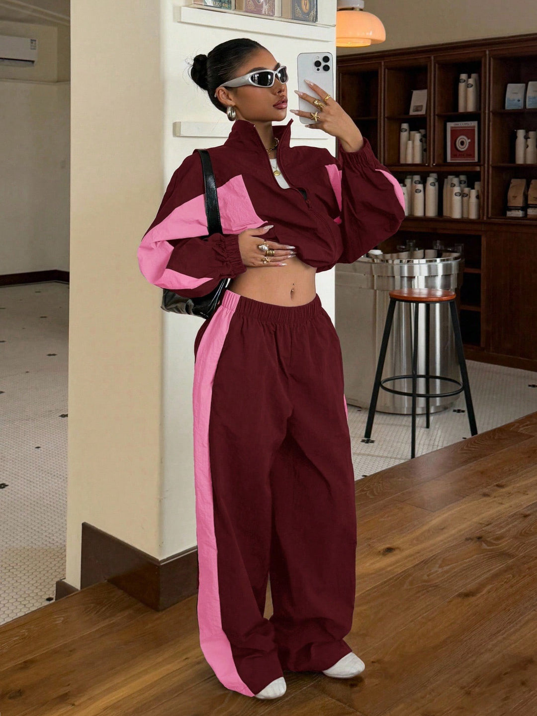 Damen Cropped-Trainingsjacke und hochgeschnittene Breitbein-Jogginghose im Set Nord Taschen