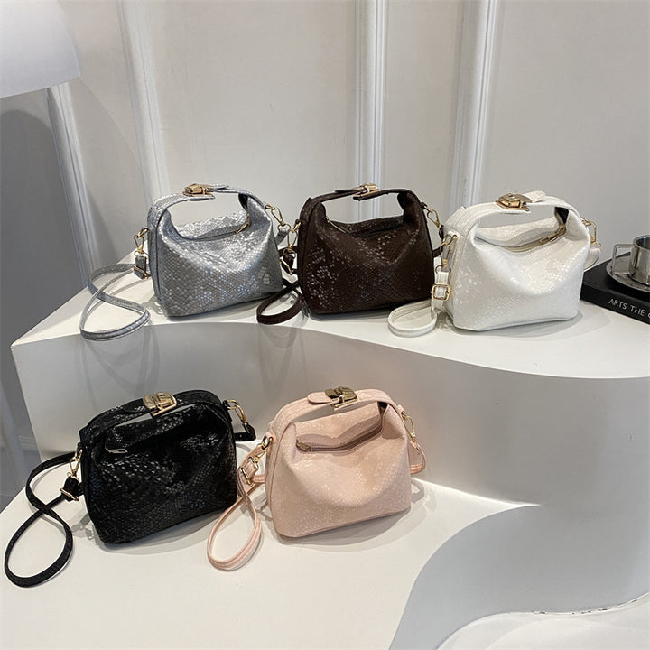Damen Umhängetasche mit eleganter Schlangenprägung und praktischem Schulterriemen Nord Taschen