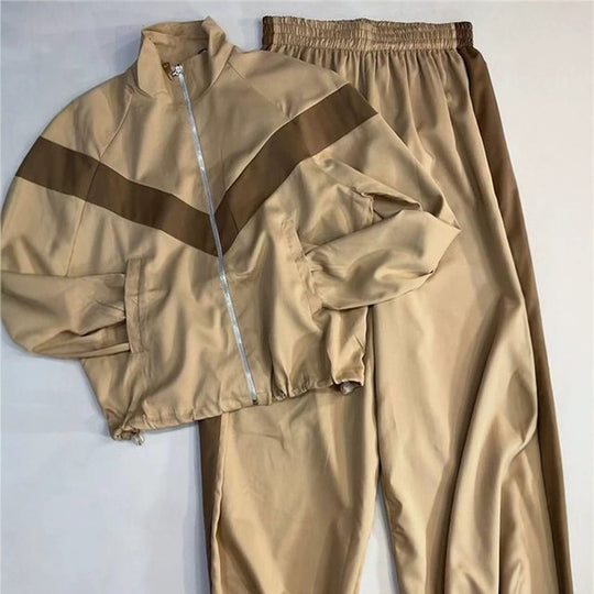 Damen Retro-Trainingsanzug mit Reißverschlussjacke und elastischer Bundhose Nord Taschen