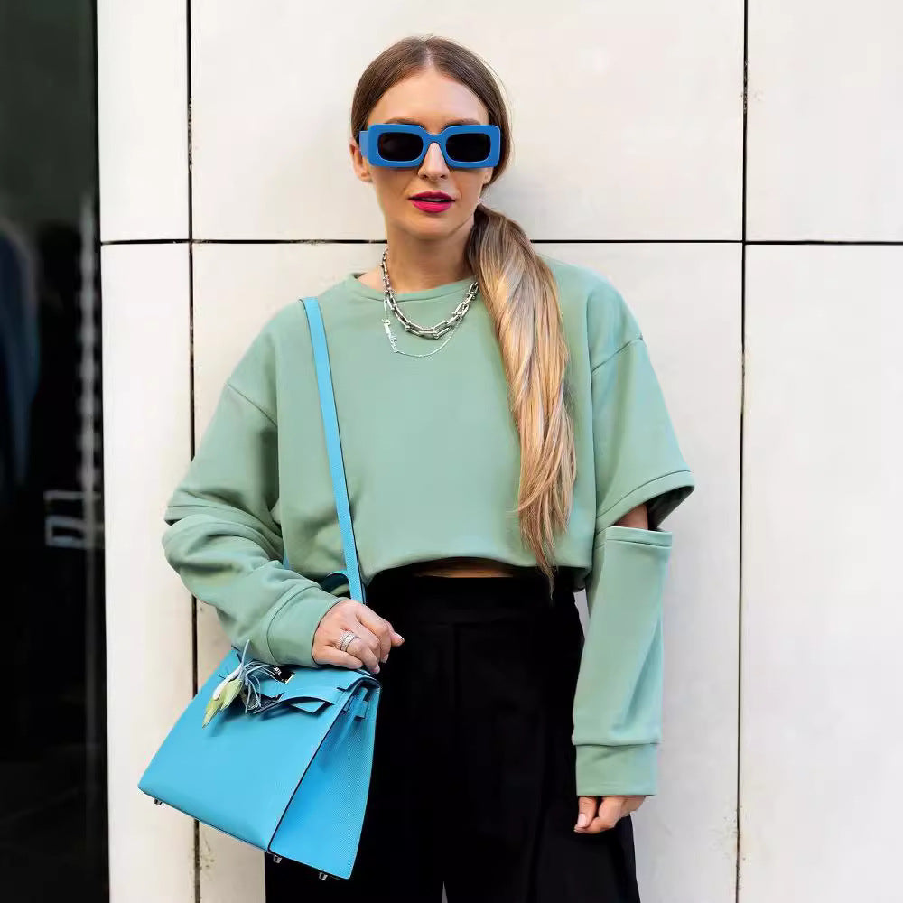 Damen Oversized Sweatshirt mit Layer-Ärmeln und seitlichem Schlitz Nord Taschen
