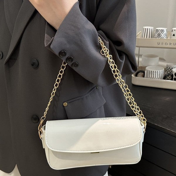 Damen elegante Clutch mit Kettenakzenten Nord Taschen
