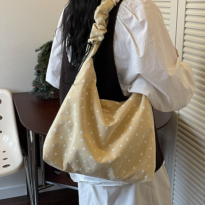 Damen Hobo-Tasche mit verspieltem Herzdesign und elastischen Trageriemen Nord Taschen