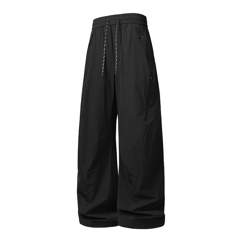 Unisex Weite Tech-Baggy-Hose mit elastischem Kordbund, Reißverschlusstaschen & wasserabweisender Nylonoptik Nord Taschen