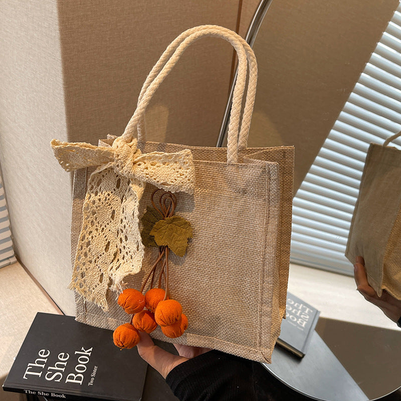 Damen Jute-Tasche mit dekorativem Spitzenband und verspielter Applikation Nord Taschen