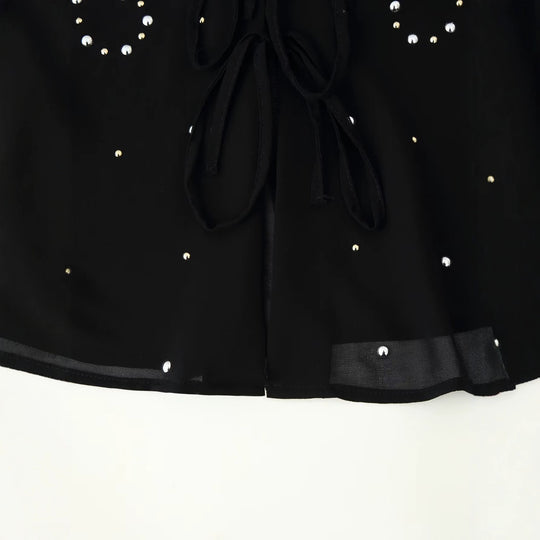 Damen Chiffon-Bluse mit Paillettenbesatz, tiefem V‑Ausschnitt und dekorativen Bindebändern Nord Taschen