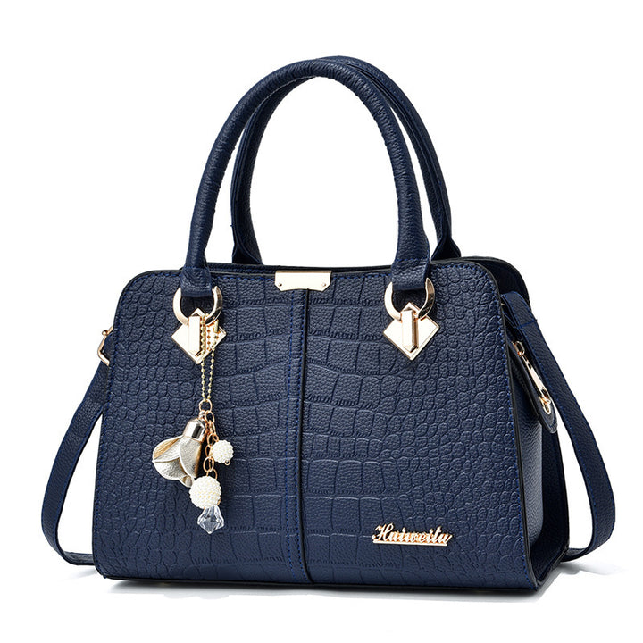 Damen elegante Handtasche mit Krokodil-Prägung und detaillierten Anhängern Nord Taschen