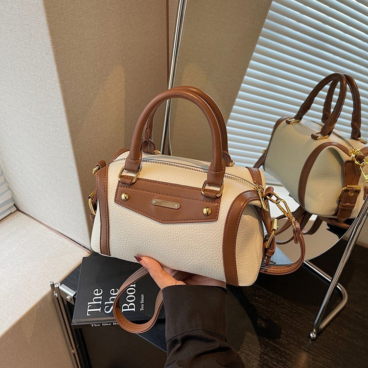Damen Handtasche aus hochwertigem Kunstleder mit elegantem Kettenakzent Nord Taschen