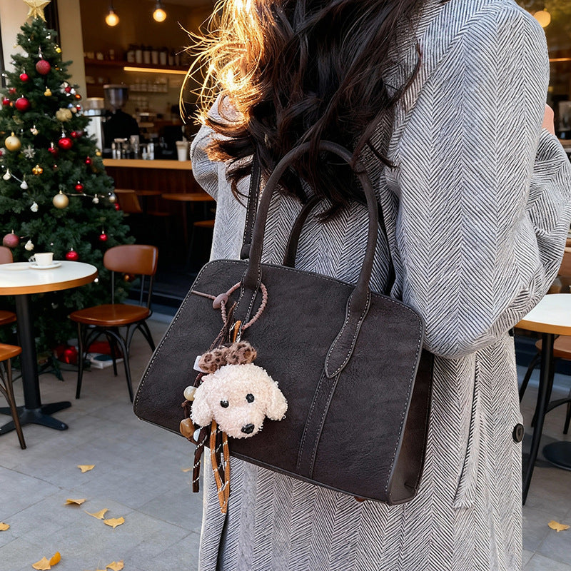 Damen modische Handtasche mit charmantem Anhänger Nord Taschen