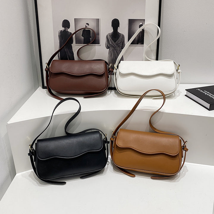 Damen Umhängetasche mit elegantem Wellenmuster Nord Taschen