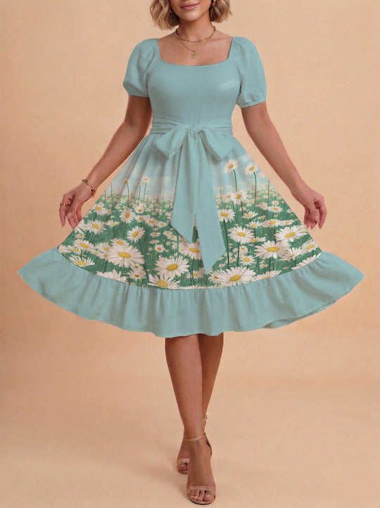 Damen Sommerliches Blumenkleid mit taillierbarem Gürtel und voluminösen Ärmeln