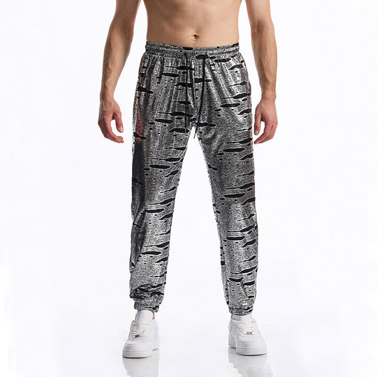 Herren Glänzende Jogginghose mit Tunnelzug, schmal zulaufendem Bein und abstraktem Print Nord Taschen