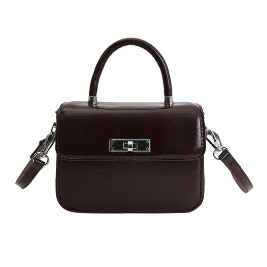 Damen Handtasche mit elegantem Kettenverschluss und abnehmbarem Schulterriemen Nord Taschen