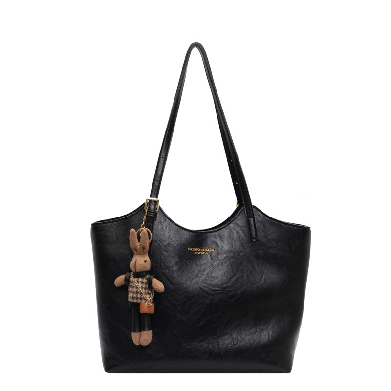 Damen große Handtasche mit verspieltem Stoffanhänger Nord Taschen