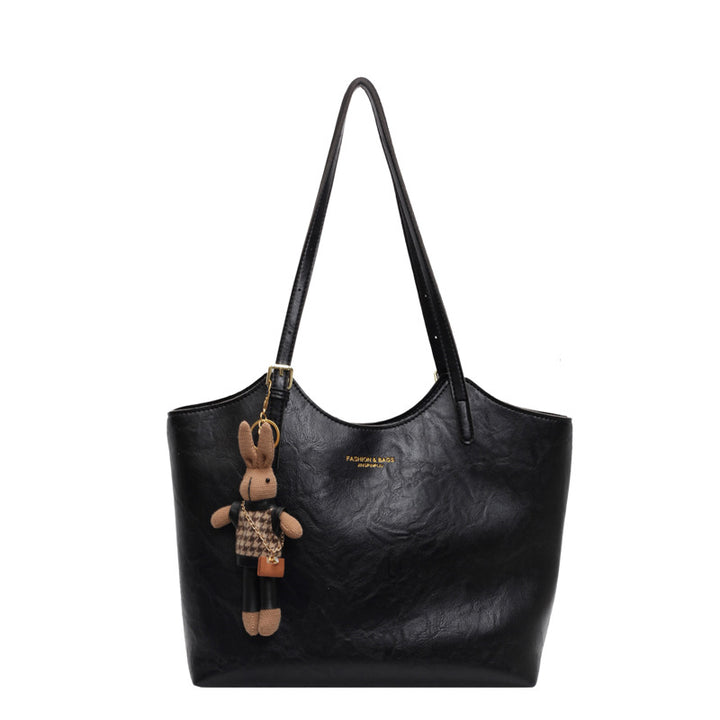 Damen große Handtasche mit verspieltem Stoffanhänger Nord Taschen