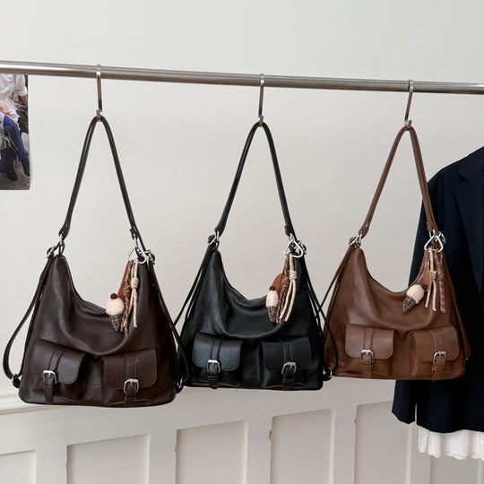 Damentasche mit strukturierten Taschen und charmanten Anhängern Nord Taschen