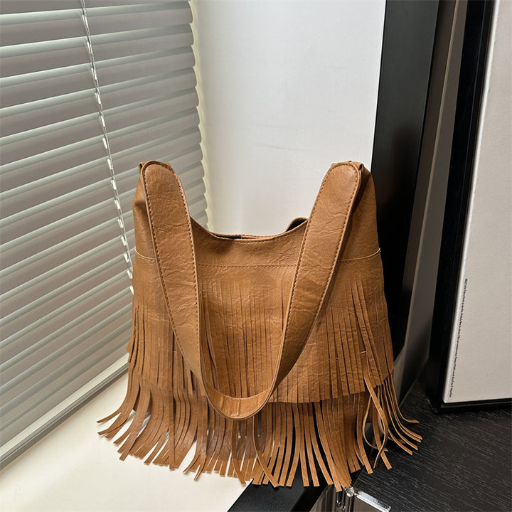 Damen Umhängetasche mit fransigem Design und robustem Tragegriff Nord Taschen