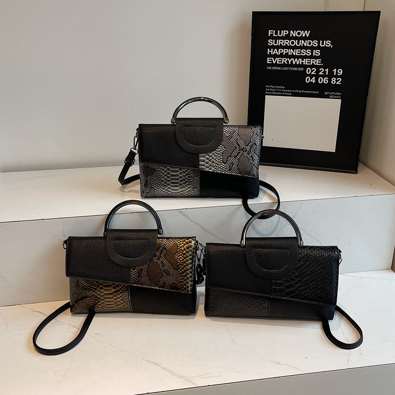 Damen elegante Umhängetasche im modernen Schlangenleder-Look Nord Taschen