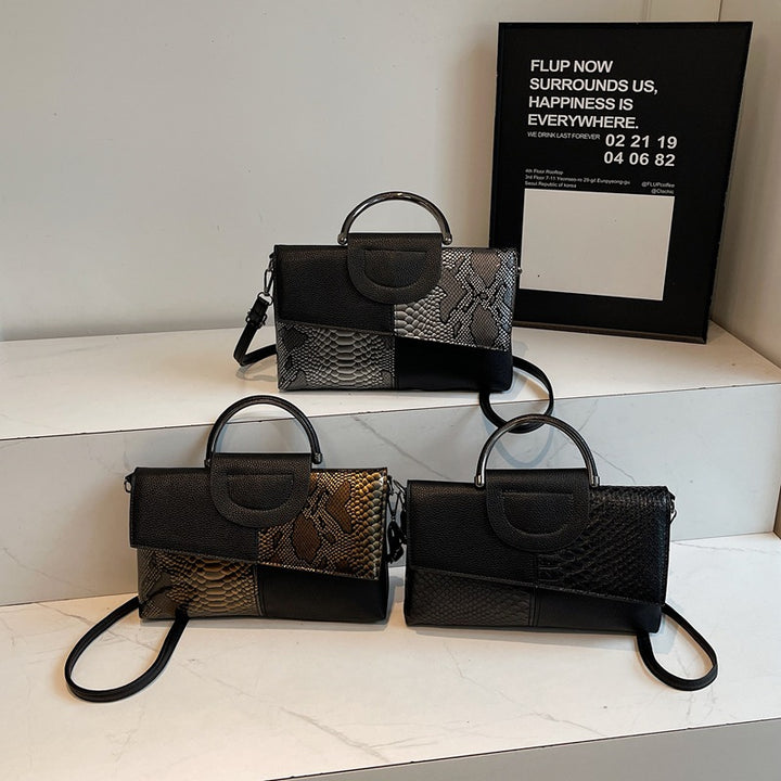 Damen elegante Umhängetasche im modernen Schlangenleder-Look Nord Taschen