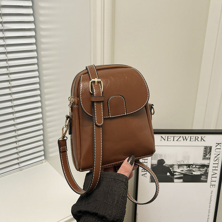 Damen edle Umhängetasche mit elegantem Klappverschluss und verstellbarem Riemen Nord Taschen