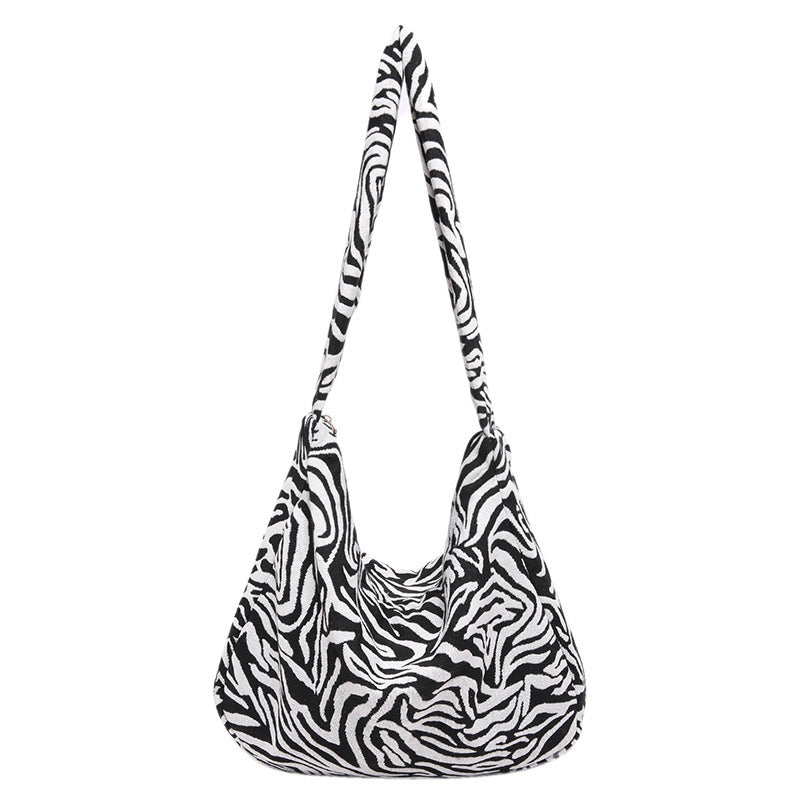 Damen trendy Beuteltasche im Zebra-Design Nord Taschen