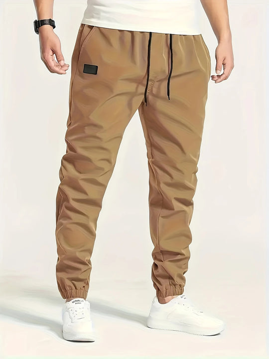 Herren Slim‑Tapered Tech‑Joggerhose mit Tunnelzugbund, elastischen Knöchelbündchen und funktionalen Seitentaschen Nord Taschen