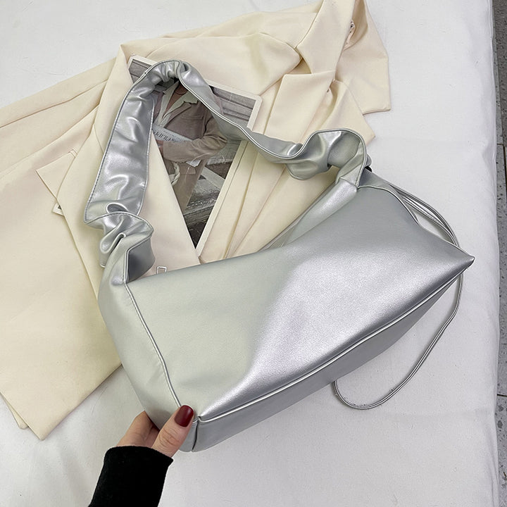 Damenhandtasche mit strukturiertem Polsterdesign und elegantem Tragegriff Nord Taschen