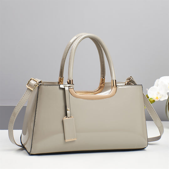 Damen elegante Handtasche mit glänzender Oberfläche und abnehmbarem Taschenschlüsselanhänger Nord Taschen