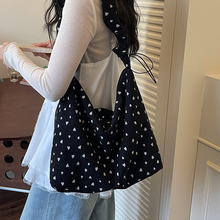 Damen Hobo-Tasche mit verspieltem Herzdesign und elastischen Trageriemen Nord Taschen