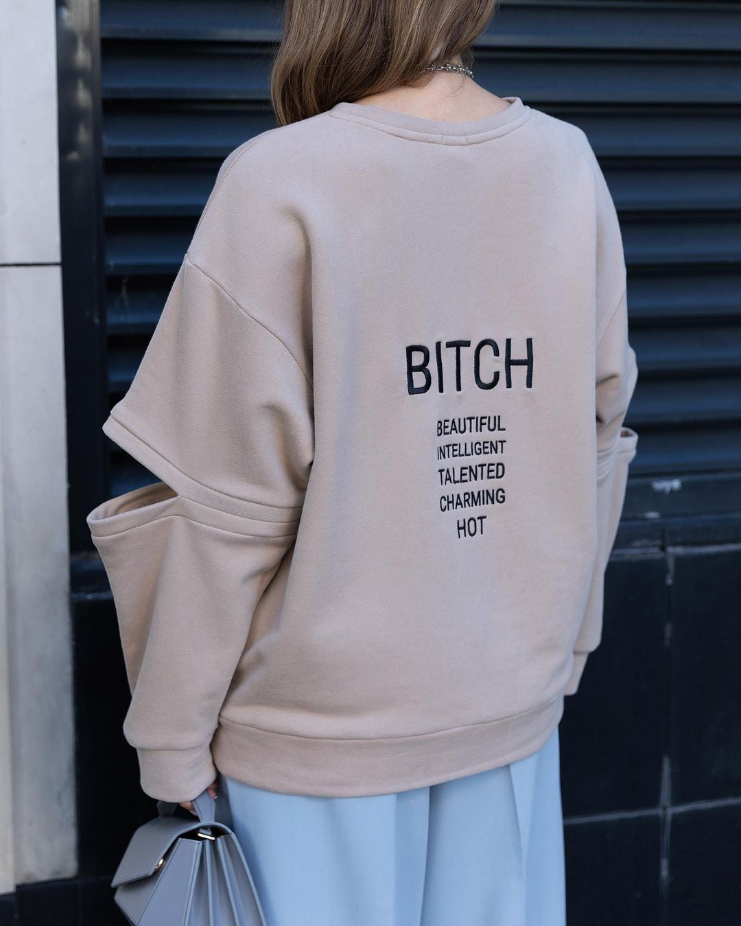 Damen Oversized Sweatshirt mit Layer-Ärmeln und seitlichem Schlitz Nord Taschen