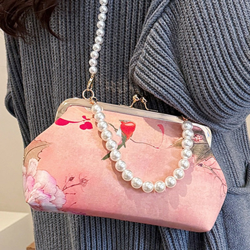 Damen elegante Handtasche mit zartem Blumendruck und Perlenkette Nord Taschen