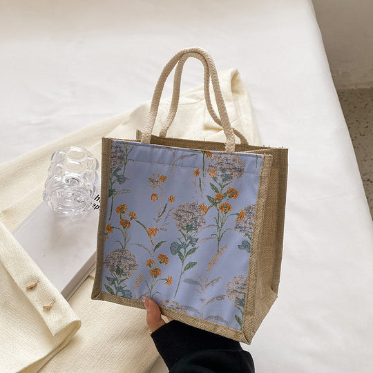 Damen Tragetasche mit floralem Dekor und robusten Materialien Nord Taschen