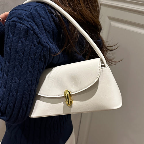 Damen elegante Handtasche mit geschwungenem Design und hochwertigem Kettenverschluss Nord Taschen