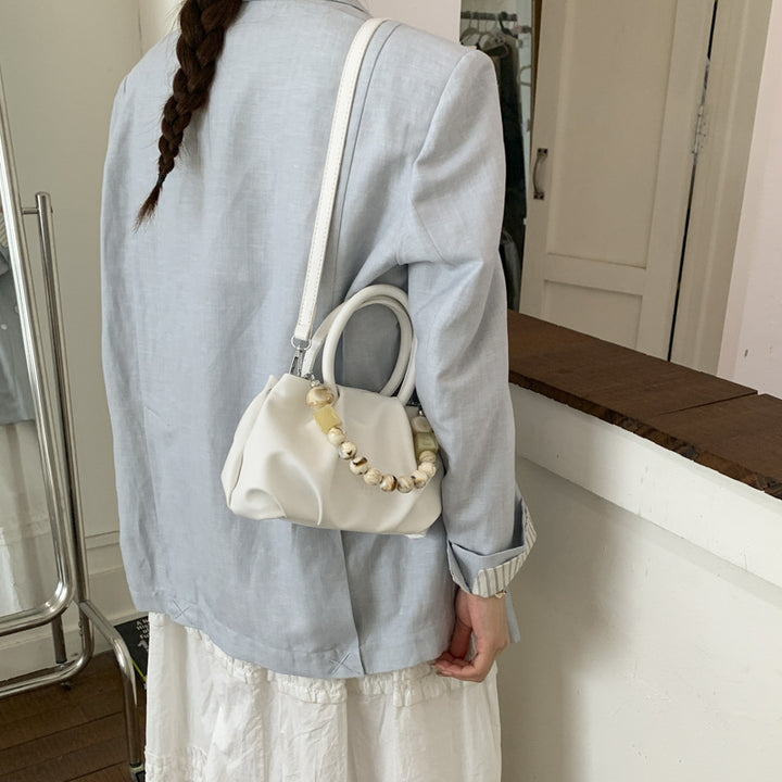 Damenhandtasche mit einzigartigem Perlenakzent Nord Taschen