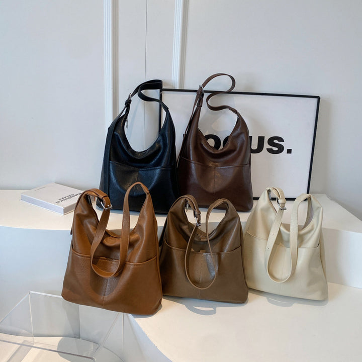 Damen moderne Wildleder-Handtasche mit verspieltem Anhänger Nord Taschen
