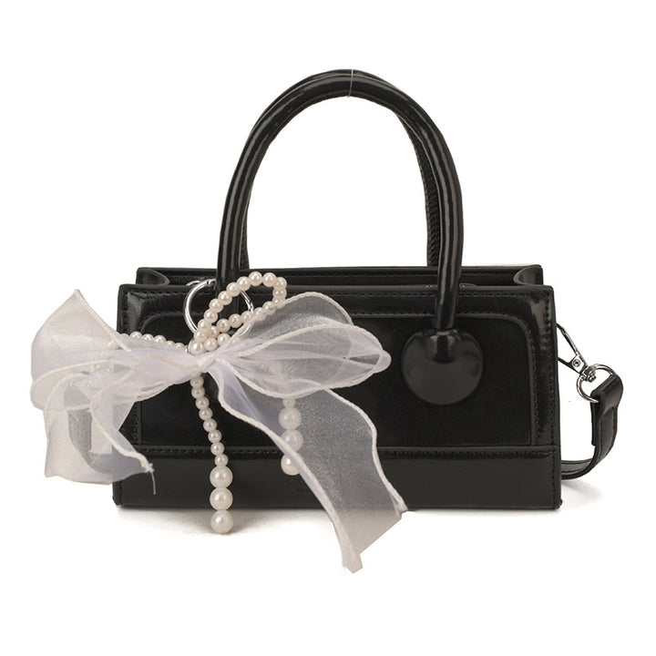 Damen elegante Handtasche mit Perlenakzent Nord Taschen