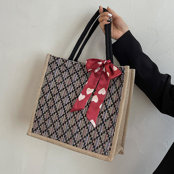 Damen Jute-Einkaufstasche mit buntem Grafikdesign und dekorativem Schleifenakzent Nord Taschen