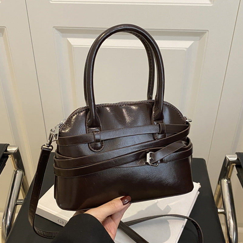 Damen Umhängetasche mit modischem Rückenverschluss und strukturiertem Design Nord Taschen