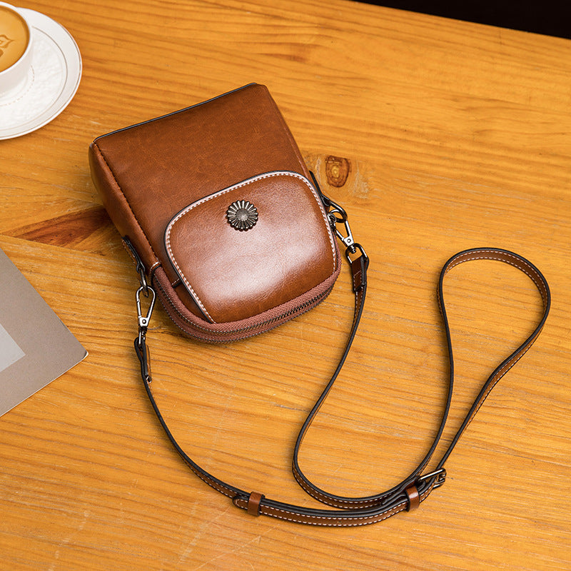 Damen Umhängetasche aus hochwertigem Kunstleder mit praktischem Faltendesign Nord Taschen