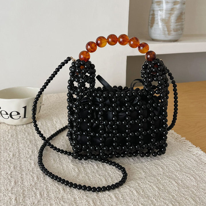 Damen elegante Perlenhandtasche mit strukturiertem Design Nord Taschen