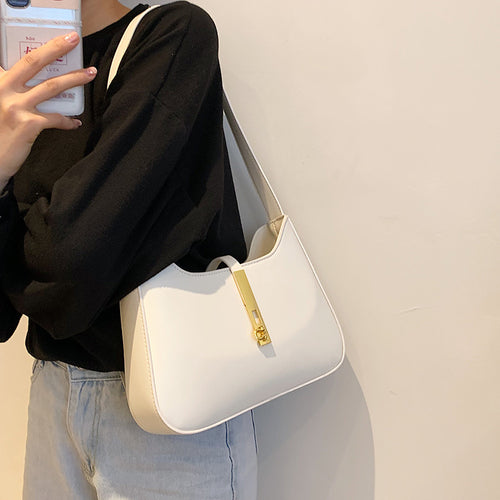 Damen Umhängetasche mit goldenen Akzenten und hochwertiger Oberfläche Nord Taschen