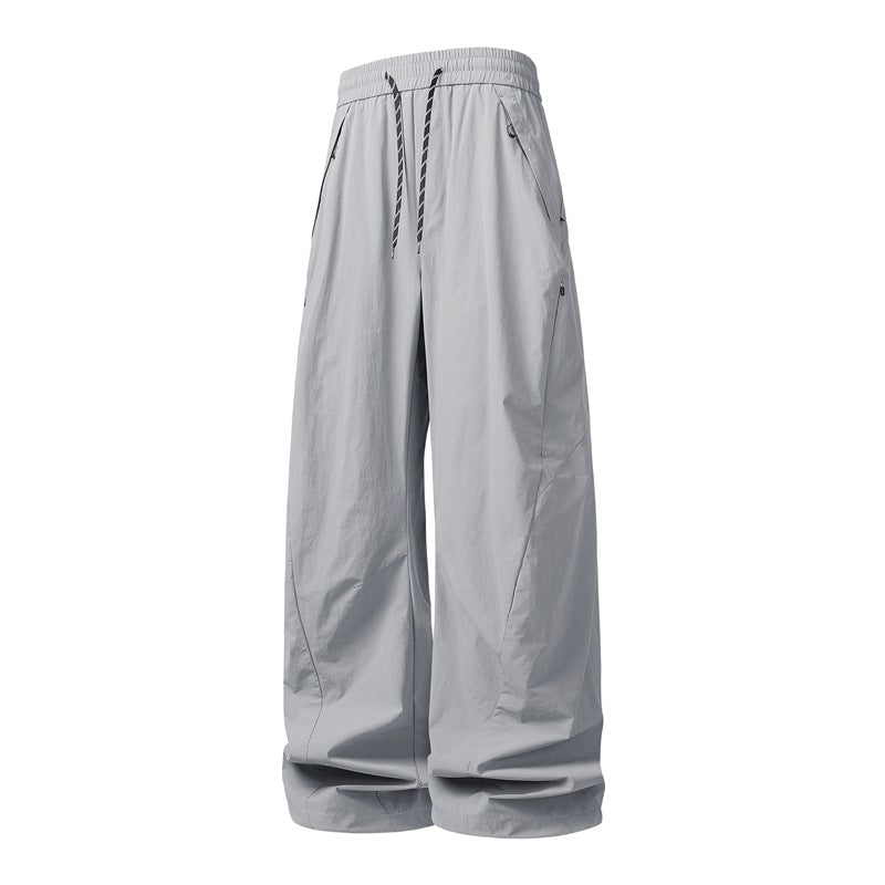 Unisex Weite Tech-Baggy-Hose mit elastischem Kordbund, Reißverschlusstaschen & wasserabweisender Nylonoptik Nord Taschen