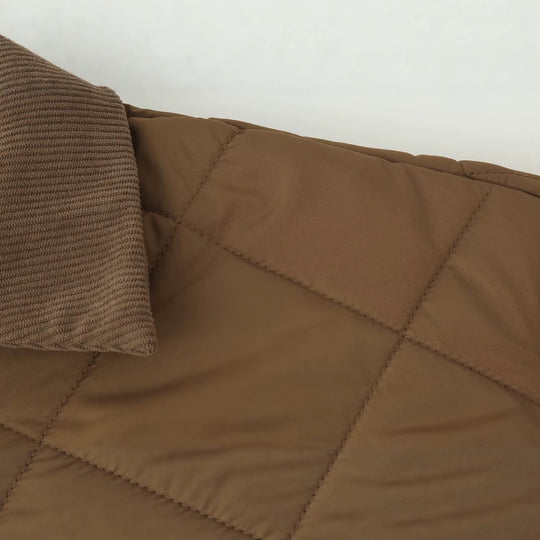 Damen Langer gesteppter Mantel mit Cordkragen und Reißverschluss Nord Taschen